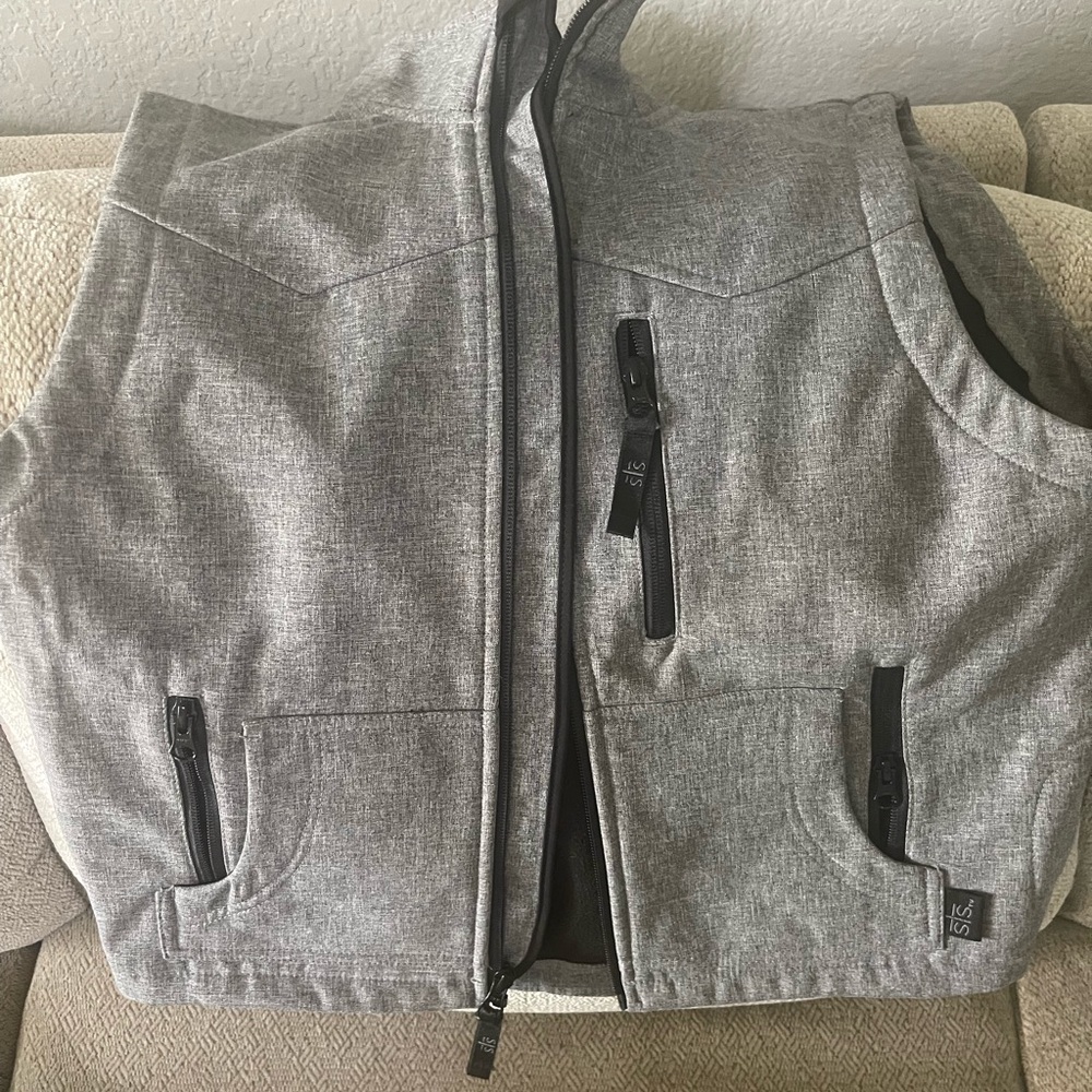 Boys XL STS Ranchwear vest. Never worn and in great condition.